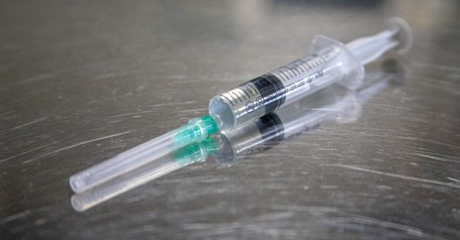 needle-on-stainless-steel-OFW image of lipotropic shot on steel
