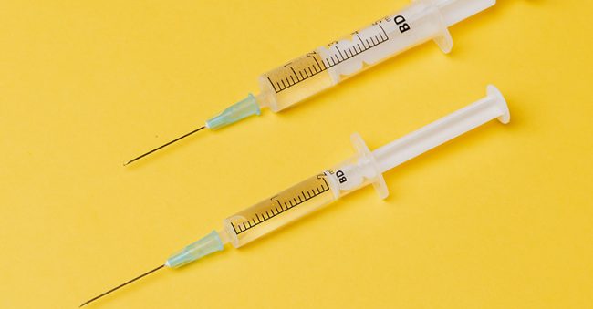 needles-on-yellow-background-OFW images of hcg injections