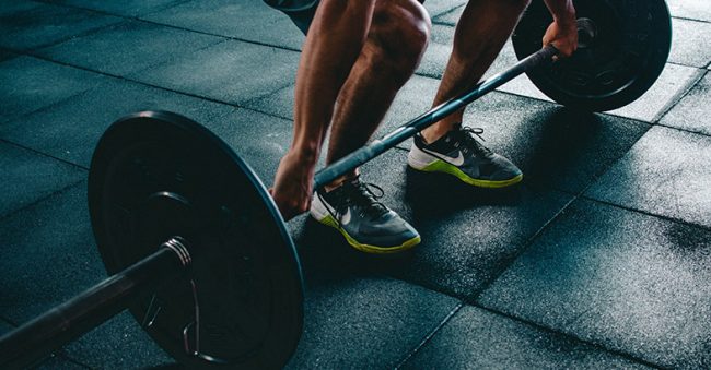 man-lifting-barbell-OFW image of man gaining muscle from using hcg injections