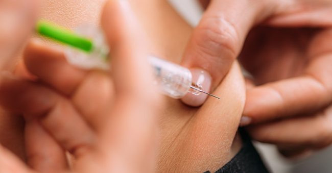 image of someone giving a hcg injection for weight loss
